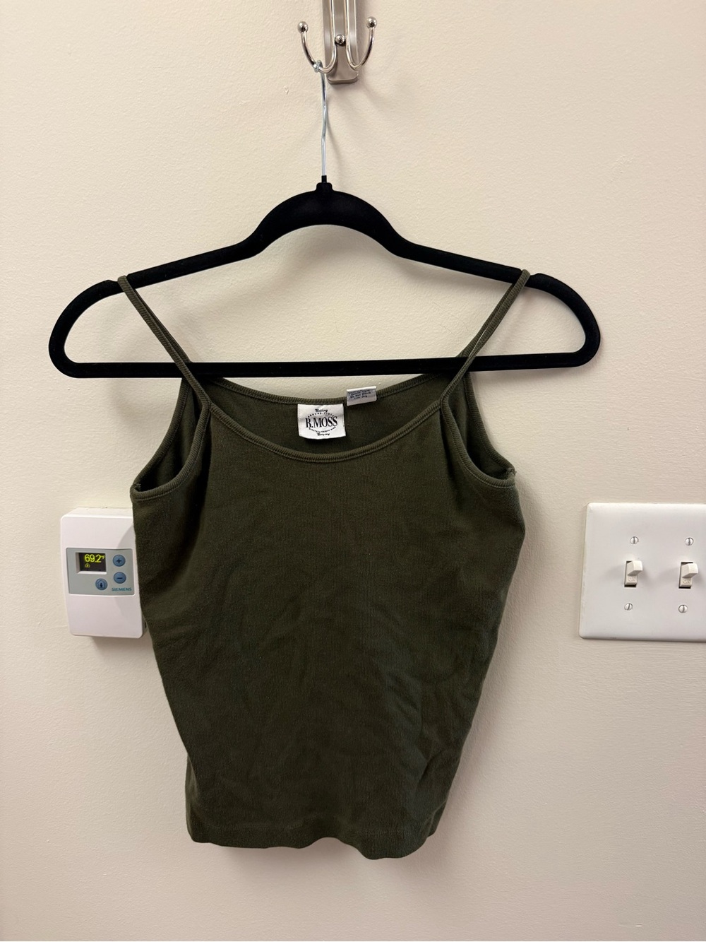 100% cotton tank. Dark forest-y green.